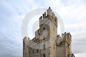 Castle in Sirmione. View to the medieval Rocca Scaligera castle in Sirmione town on Garda lake, Italy. Scaliger Castle 13th