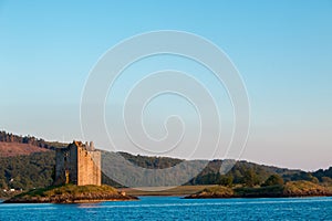 Castle Stalker tower house or keep picturesquely set on a tidal islet on Loch Laich photo