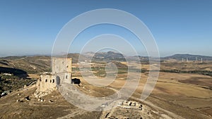 the castle of the star in the municipality of Teba as seen from a drone at sunset, Andalusia