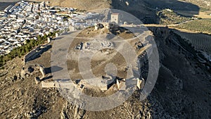 the castle of the star in the municipality of Teba as seen from a drone at sunset, Andalusia