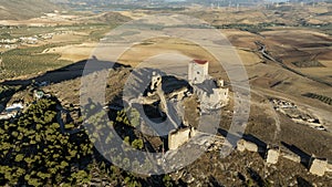 the castle of the star in the municipality of Teba as seen from a drone at sunset, Andalusia