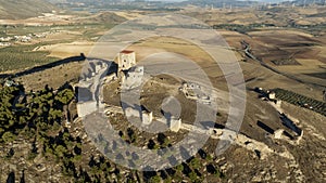 the castle of the star in the municipality of Teba as seen from a drone at sunset, Andalusia