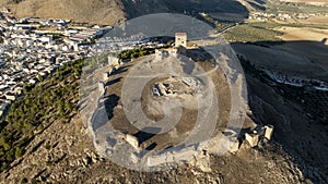 the castle of the star in the municipality of Teba as seen from a drone at sunset, Andalusia