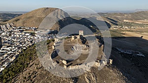 the castle of the star in the municipality of Teba as seen from a drone at sunset, Andalusia