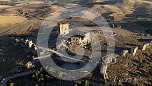 the castle of the star in the municipality of Teba as seen from a drone at sunset, Andalusia