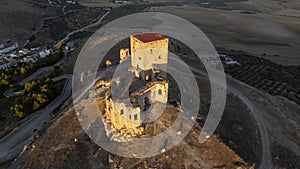 the castle of the star in the municipality of Teba as seen from a drone at sunset, Andalusia