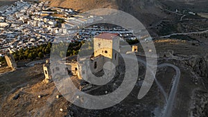 the castle of the star in the municipality of Teba as seen from a drone at sunset, Andalusia