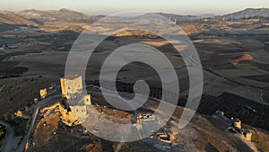 the castle of the star in the municipality of Teba as seen from a drone at sunset, Andalusia