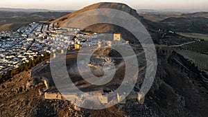 the castle of the star in the municipality of Teba as seen from a drone at sunset, Andalusia