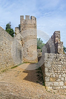 Castle stone tower and wall in Santiago do Cacem