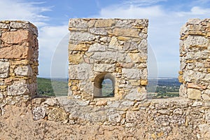 Castle stone wall in Santiago do Cacem photo