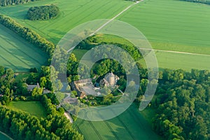 The castle is surrounded by fields, the view from the top of the troposphere photo