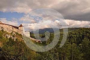 Castle surrounded by the forest in Rumania photo