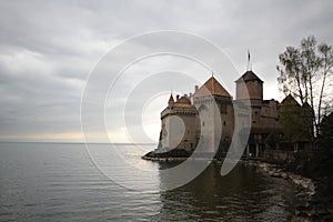 Castle at Switzerland and wonderful lake, travel destination at Lake Geneve, ancient historical landmark brick stone medival