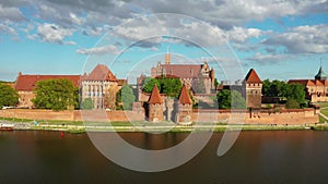 The Castle of the Teutonic Order in Malbork by the Nogat river.