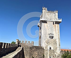 castle tower in beja, portugal (medieval european palace detail with stone wall crenellations, lantern) travel tourism