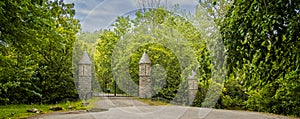 Castle towers in a front of front entrance of a property photo