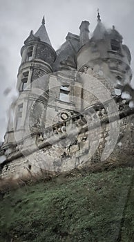 Castle under the rain through car"s windiw