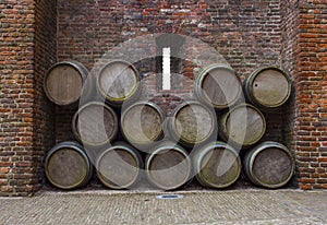 Castle wall porthole and barrels