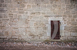 Castle wall and wooden door