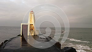 Castlerock Northern Ireland. Destroyed lighthouse on the waterfront photo
