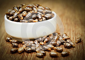 Castor beans in a ceramic bowl