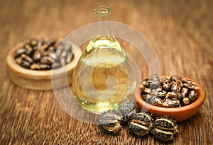 Castor beans and oil photo