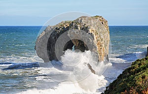 Castro islet in Andrin beach, Llanes (Asturias) photo