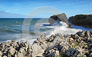 Castro islet in Andrin beach, Llanes (Asturias) photo