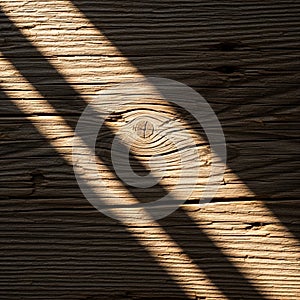 Casts diagonal shadows on a textured wooden surface highlighting