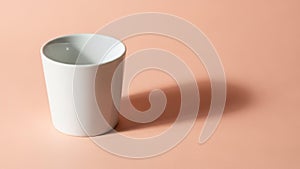 Casts a shadow to the right indicating a light source from the