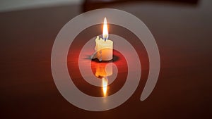 Casts a warm soft glow and creates a reflection on the surface