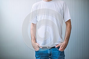 Casual adult male wearing blank white t-shirt