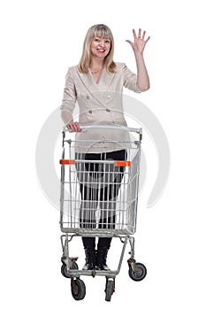 casual adult woman with shopping cart . isolated on a white background.