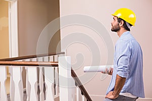 Casual architect walking up the stairs