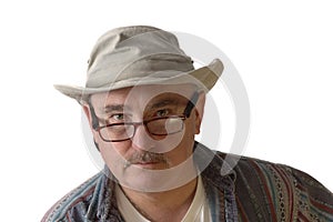 Casual baby-boomer in hat and glasses photo