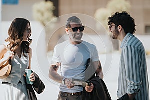 Casual business meeting outdoors with young professionals interacting