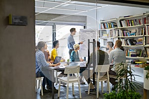 Casual business people working in meeting room