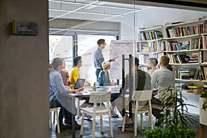 Casual business people working in meeting room photo