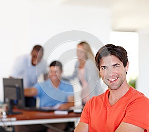 Casual, businessman and happy in portrait at job with colleagues, working or office or smile. Male person, company and
