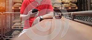 Casual Businessman holding and using smartphone for sms messages, young man typing touchscreen mobile phone in coffee cafe or