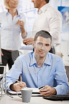 Casual businessman working in office