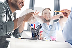 Casual businessmen working on new project at modern office