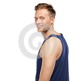 Casual and carefree. Studio portrait of a smiling young man isolated on white.