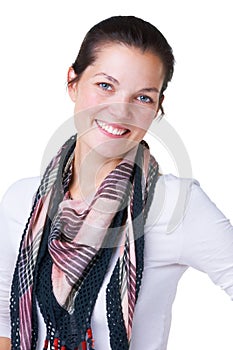 Casual and confident. Portrait of an attractive young brunette woman against a white background.