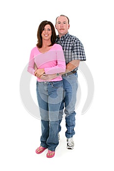 Casual Couple Standing Together Over White