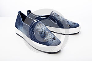 casual denim shoes isolated on a white background, denim sneakers