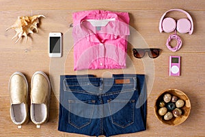 Casual Female Outfit on Wooden Background