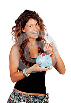 Casual girl with a blue piggy-bank