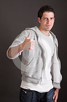 Casual guy thumbs up - success